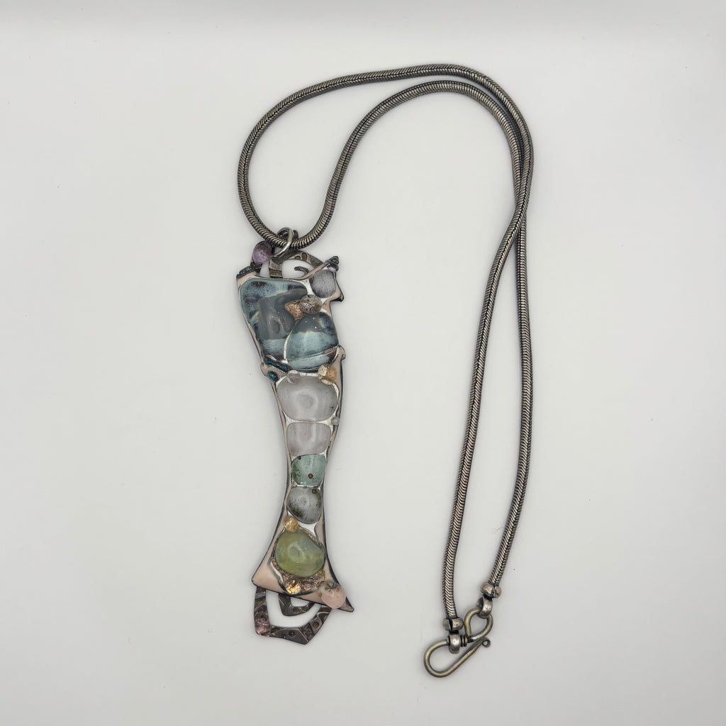 Le pendentif poisson abstrait en argent